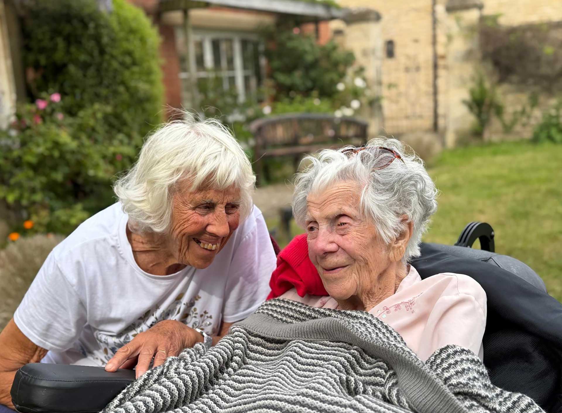 Residents sitting outside